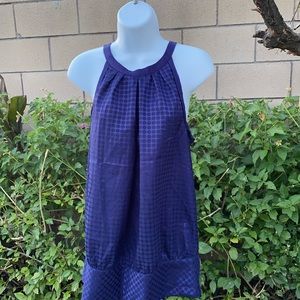 Calvin Klein sleeveless blouse.